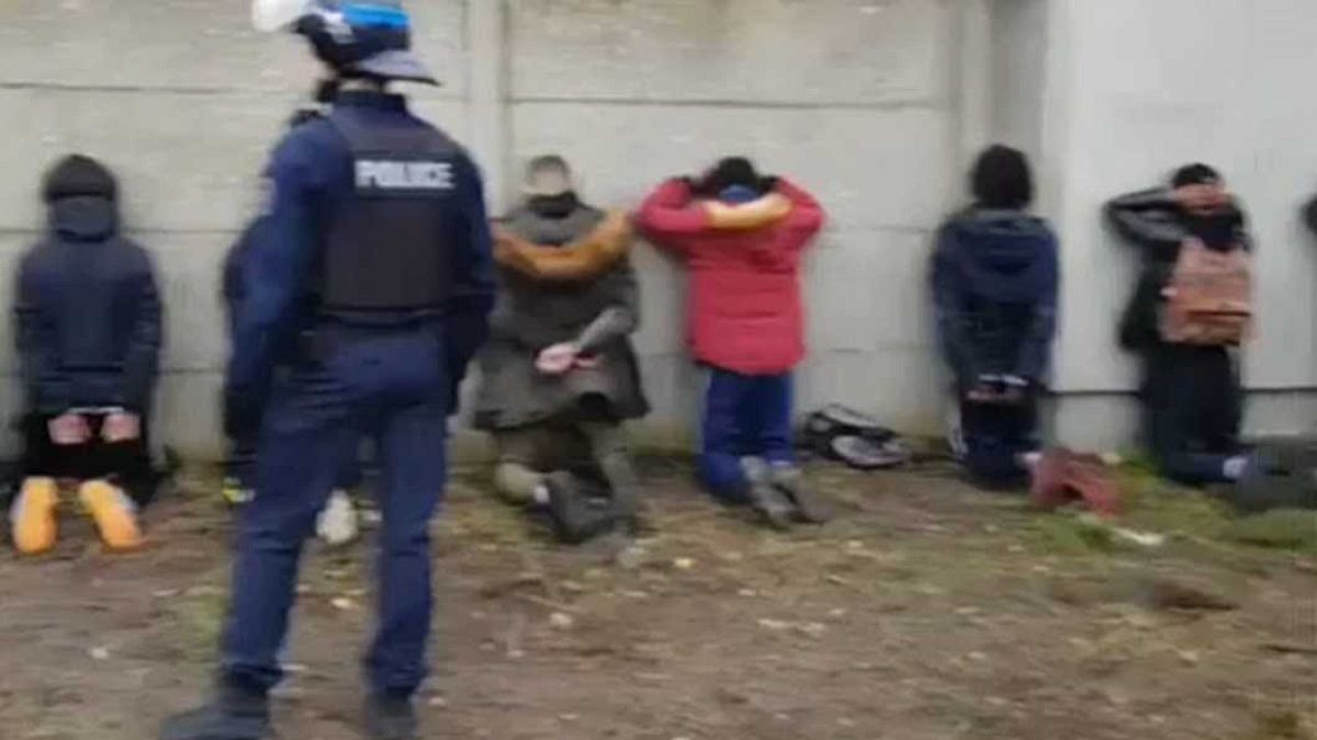 Anger over video of French police surrounding kneeling teenage protesters 