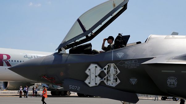 A US airman in the cockpit of a Lockheed Martin F-35 Lightning II aircraft A US airman in the cockpit of a Lockheed Martin F-35 Lightning II aircraft
