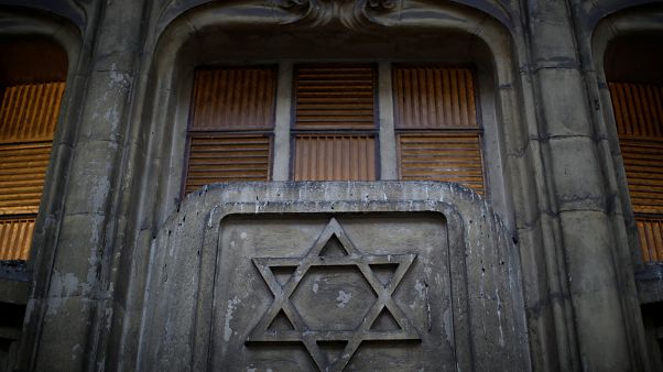 The Star of David on the facade of a synagogue in Paris, France. The Star of David on the facade of a synagogue in Paris, France.