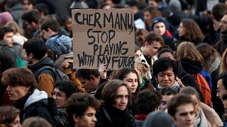 Students attend a demonstration to protest against government reform