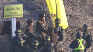 North & South Korean troops cross borders in peace