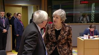 Theresa May and Jean-Claude Juncker caught on camera in tense exchange