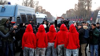 Bare-breasted ‘Mariannes’ face off with Paris police in silent protest