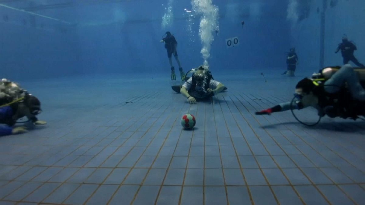 The Russian divers playing rugby under water