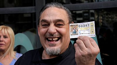 Spain's Christmas lottery winners celebrate "the Fat One"