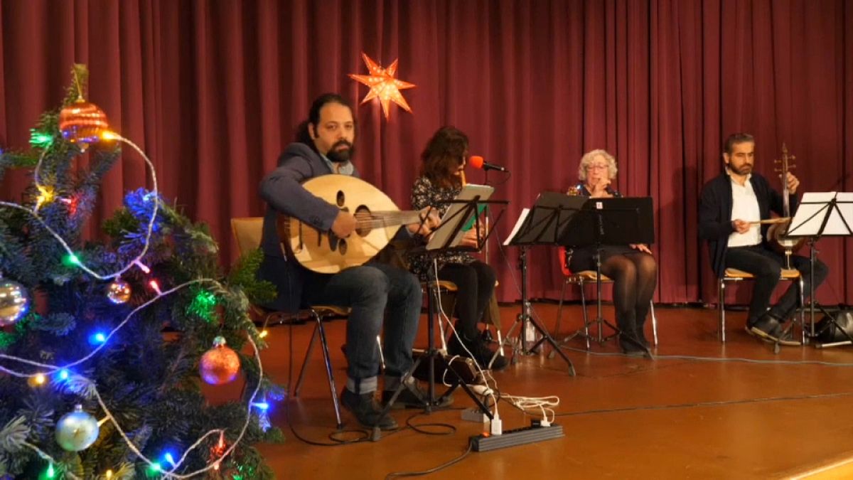 حفل موسيقي في برلين لأداء أناشيد الميلاد بالعربية