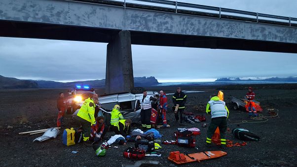 The emergency response at the bridge a car drove off The emergency response at the bridge a car drove off