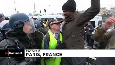 Yellow vest demonstrators clash with police in Paris