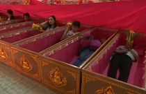 Mock funeral helps Thai worshippers prepare for 2019