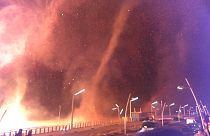 Swirls of fire near a New Year's bonfire in Scheveningen in The Hague