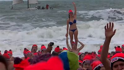 Thousands of Dutch swimmers brave the cold North Sea on New Year's Day