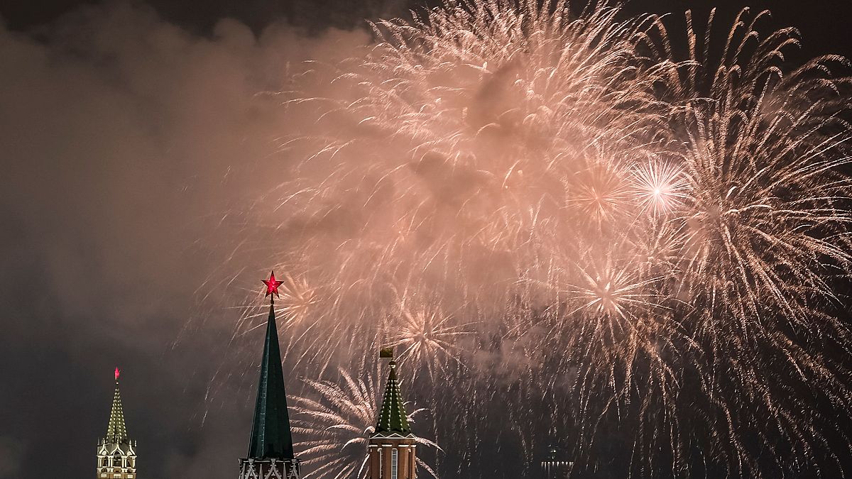 Fireworks explode in the sky over the Kremlin during New Year celebrations 