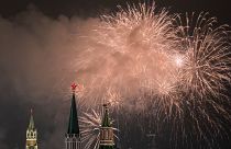 Fireworks explode in the sky over the Kremlin during New Year celebrations