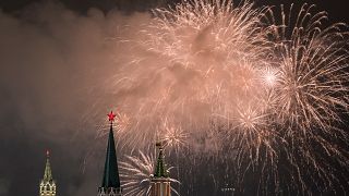 Fireworks explode in the sky over the Kremlin during New Year celebrations 