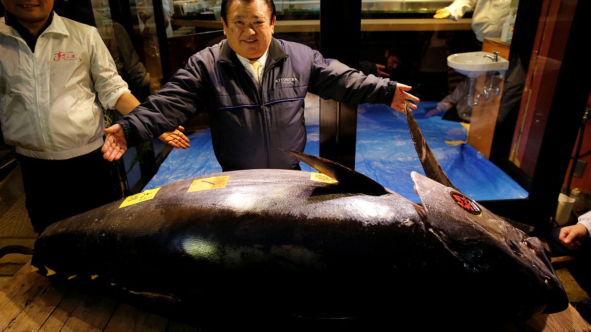 Kiyoshi Kimura poses with a 278kg bluefin tuna