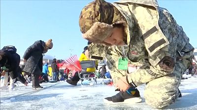 South Korea's ice fishing festival lures locals and foreign tourists