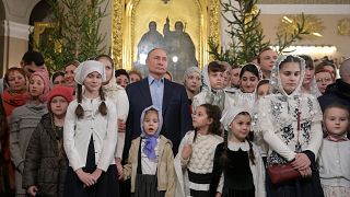 Putin celebrates Christmas with orthodox Christians in St Petersburg