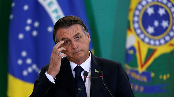 Presidente Jair Bolsonaro numa cerimónia no Palácio do Planalto Presidente Jair Bolsonaro numa cerimónia no Palácio do Planalto
