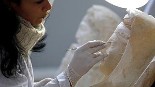 Palmira'da zarar gören eserler arkeologların elinde yeniden hayat buluyor