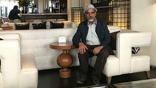 نعمت احمدی در گفت‌وگو با یورونیوز: بهاییت دین غیر رسمی است نه دین مجرمانه