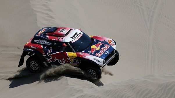 El piloto de X-Raid Mini JCW, Stéphane Peterhansel. El piloto de X-Raid Mini JCW, Stéphane Peterhansel.