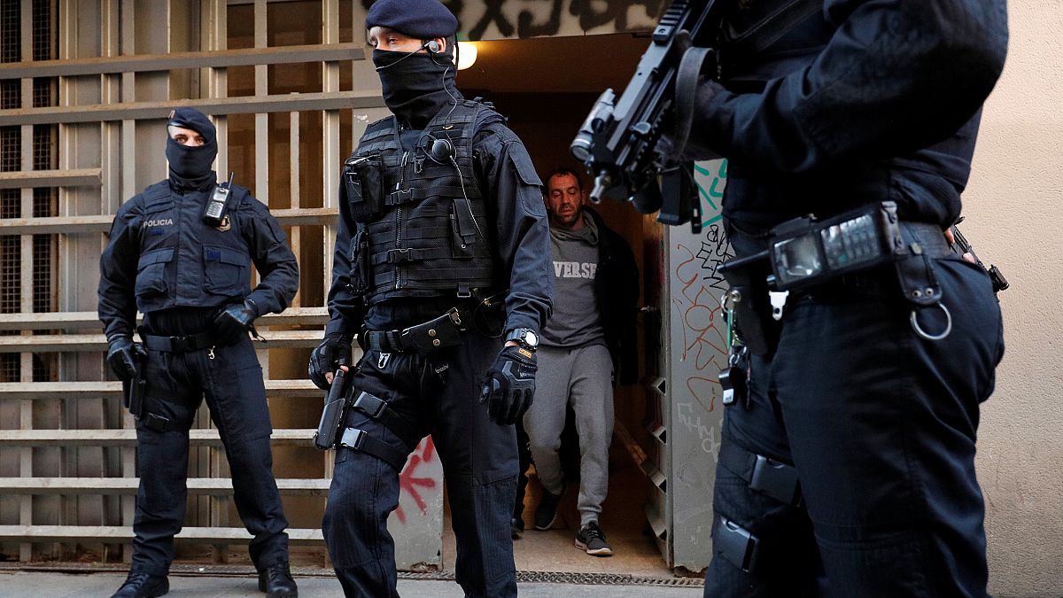 Catalan police arrest over 17 people during anti-terrorist raid in Barcelona and nearby town