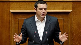 Prime Minister Alexis Tsipras addresses the Greek parliament.