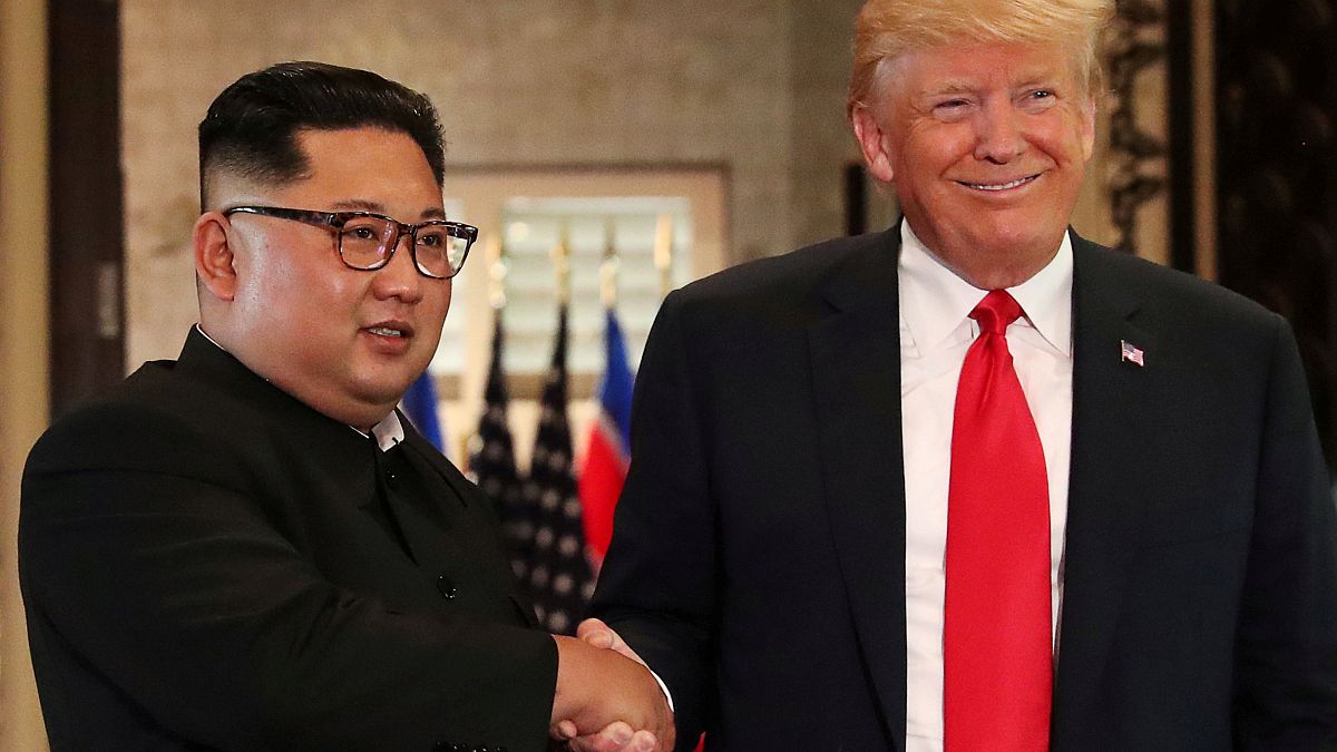  Donald Trump and Kim Jong Un in Singapore June 12, 2018.