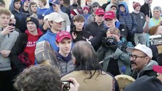 Nick Sandmann faces off with Nathan Phillips