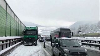 Italy: Firefighters rescue 200 people trapped in snowy motorway