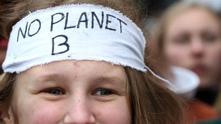 A protestor at the Brussels student march for climate