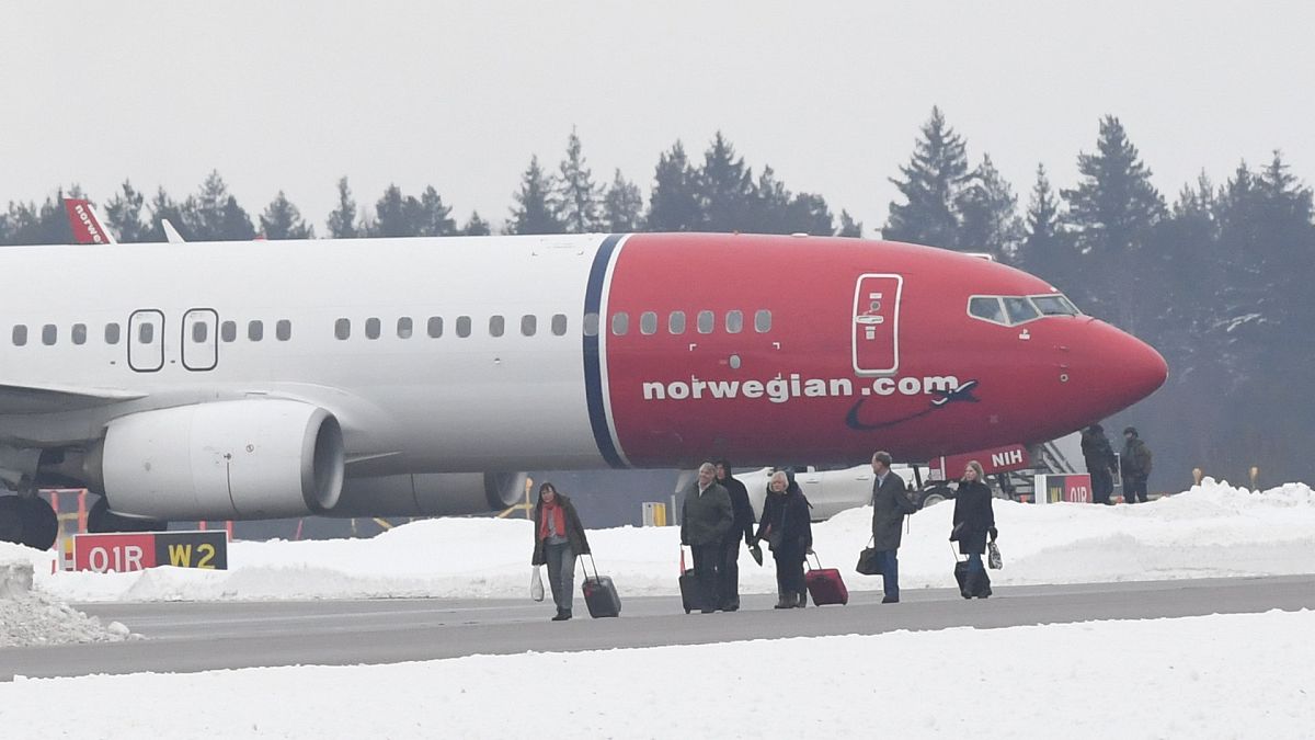 Passengers evacuate Norwegian Air Shuttle plane after bomb threat 