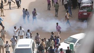 Tear gas is fired by police at an anti-government protest in Khartoum