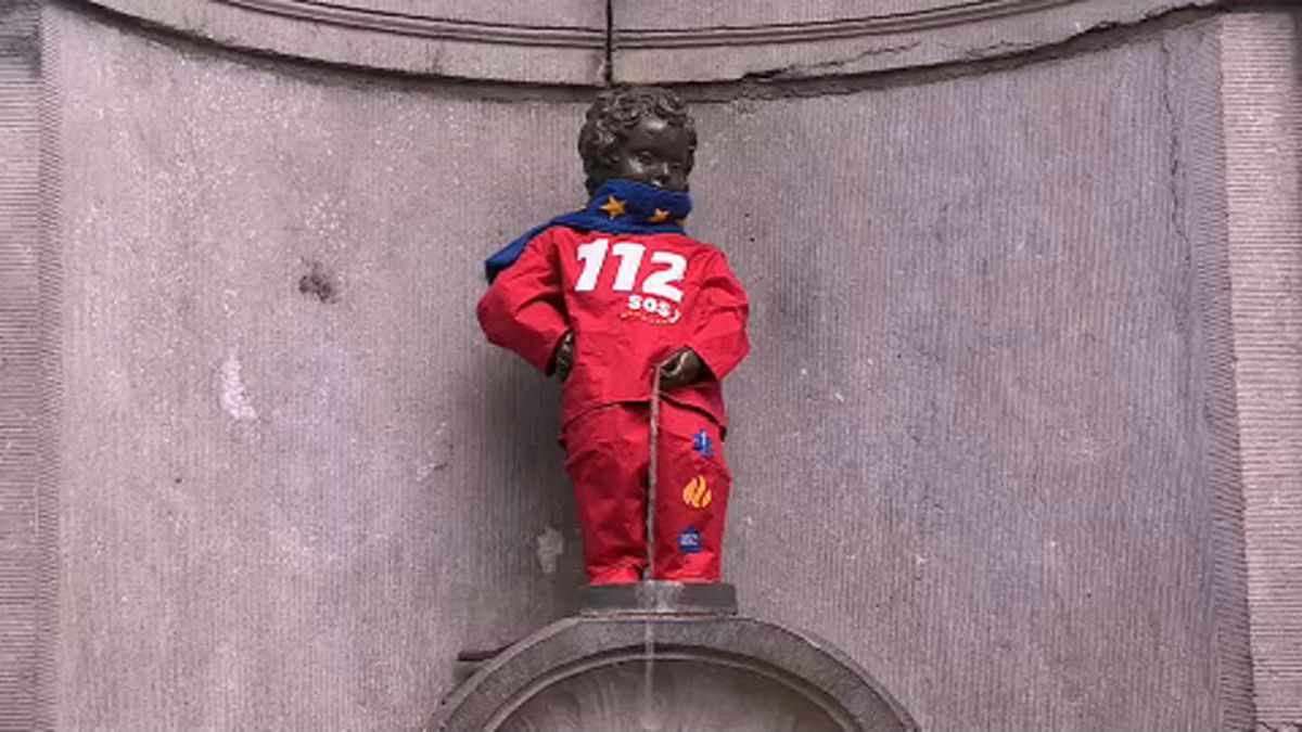 Manneken Pis dons European Emergency Number Association costume for 112 Day