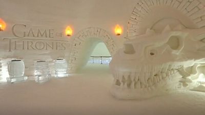 Snow sculptures including the army of the dead and dire wolves await guests