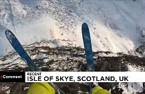 Daredevil base jumper performs outrageous leaps on Scottish mountains