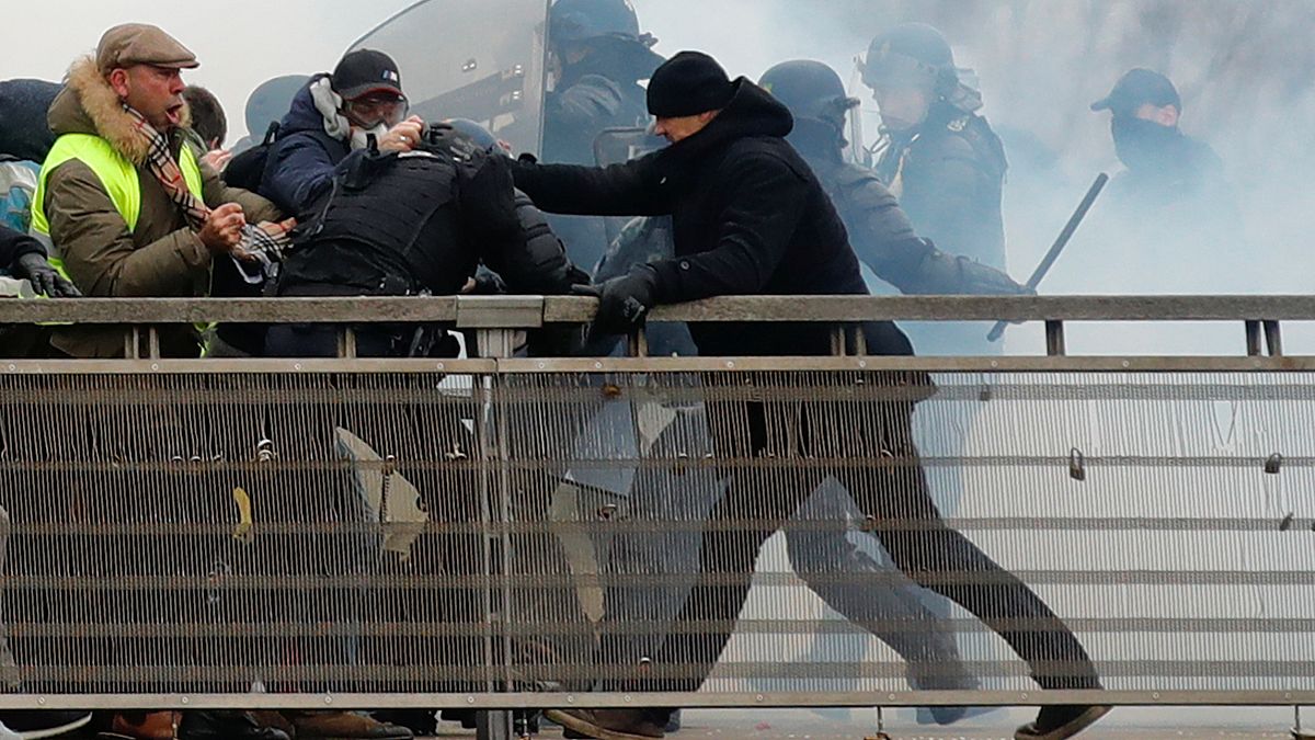  Former French boxing champion, Christophe Dettinger is seen during clashes