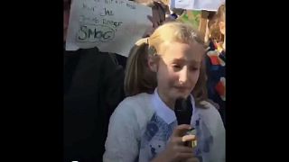 A tearful Iris, 11, making a climate plea in Cornwall.