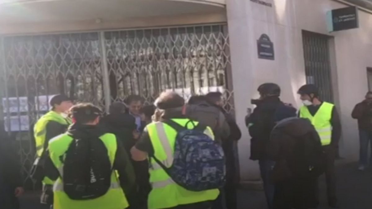 Finkielkraut is surrounded by Gilets Jaunes protesters in Paris on Saturday