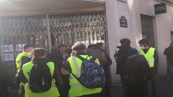 Finkielkraut is surrounded by Gilets Jaunes protesters in Paris on Saturday Finkielkraut is surrounded by Gilets Jaunes protesters in Paris on Saturday