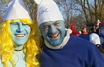 Participants of a bid to break the record for the largest Smurfs meeting