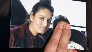  Renu Begum, sister of Shamima Begum, holds a photo of her sister.