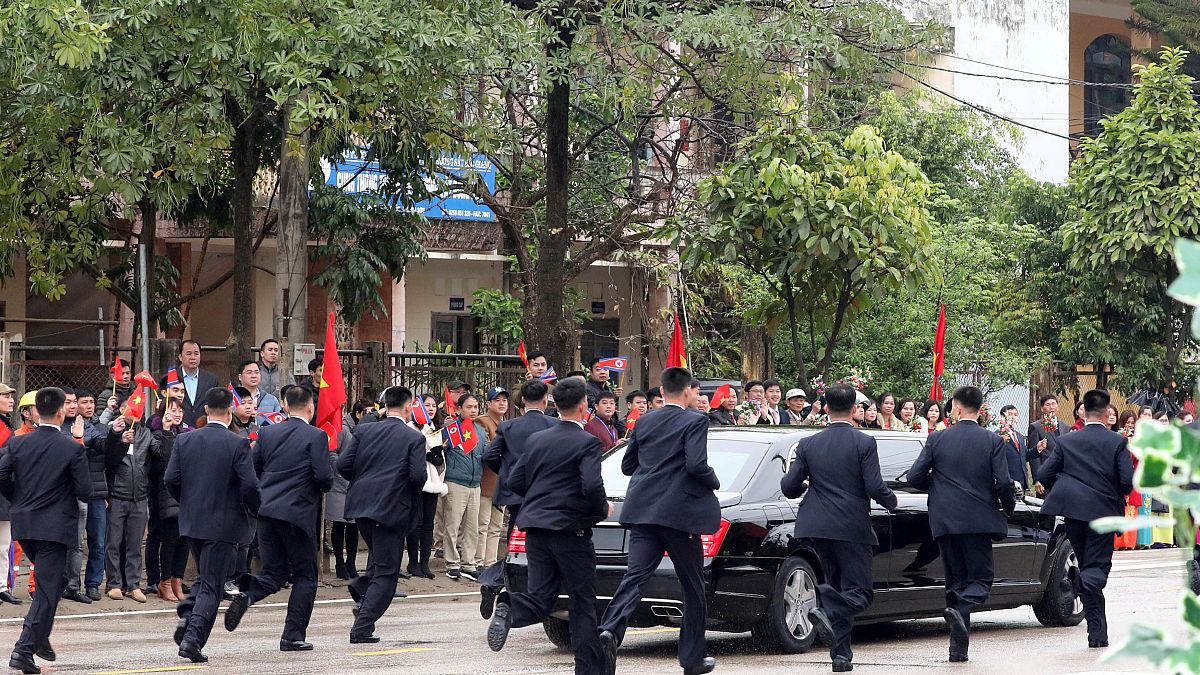 North Korea's Kim Jong-un accompanied by running bodyguards on his way to Hanoi