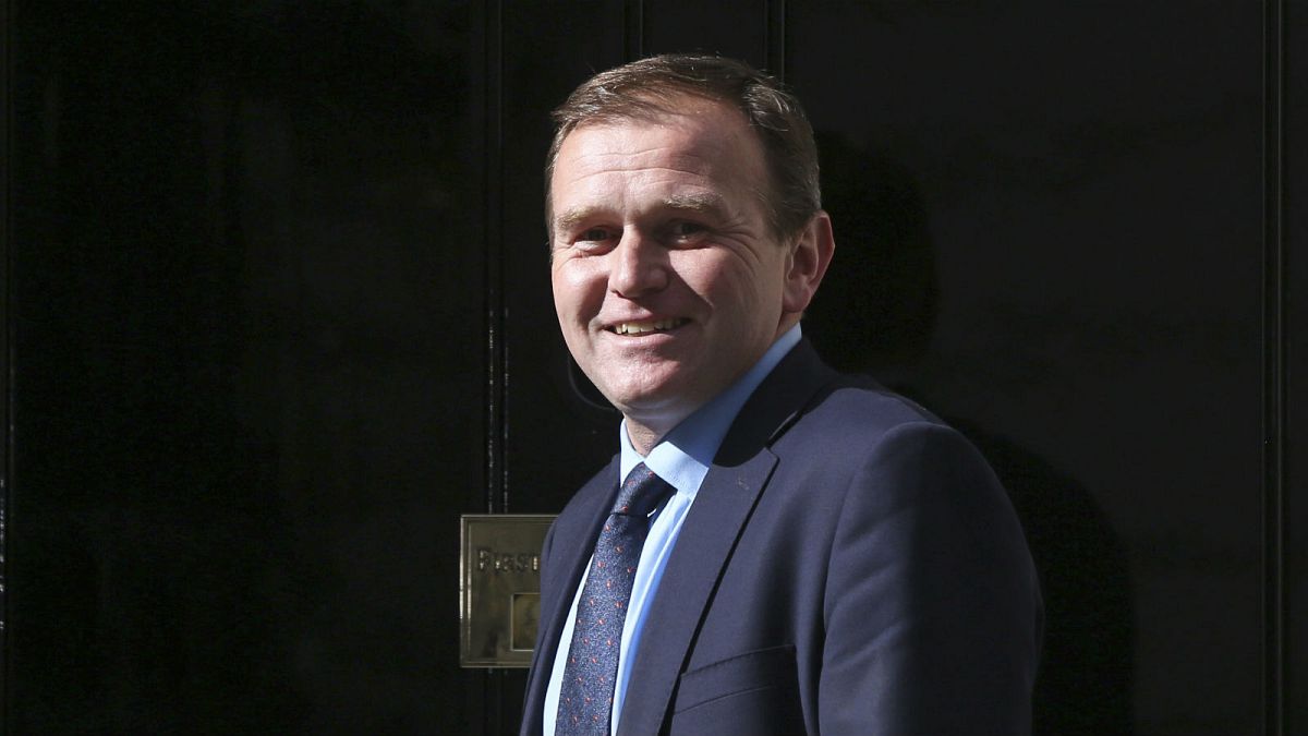 UK junior minister George Eustice resigns over possible Brexit delay