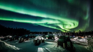 Aurora borealis illuminates Lapland sky