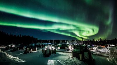 Aurora borealis illuminates Lapland sky