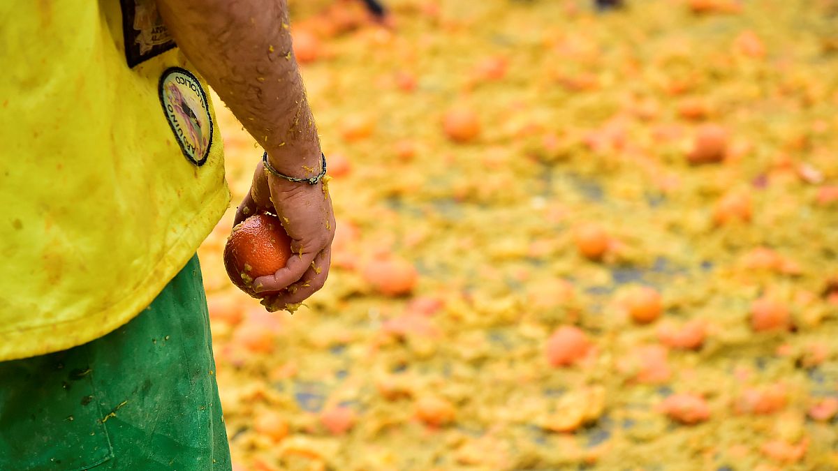 Italians have massive fruit fight in annual Battle of the Oranges