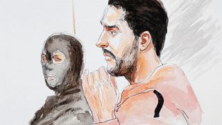A court artist drawing shows Mehdi Nemmouche (right) during his trial.