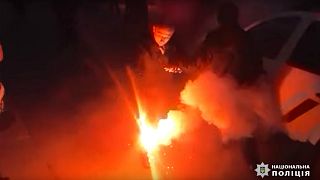 Ukrainian police officers injured in clash with far-right protesters at presidential event