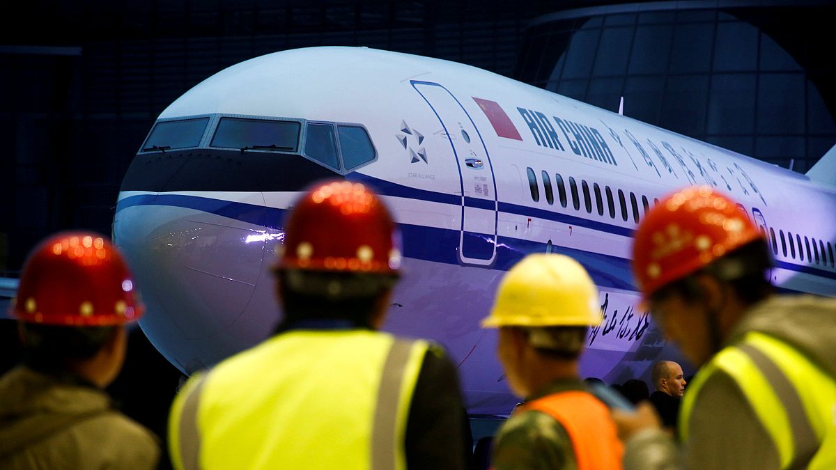 خلال مراسم تسليم دفعة من طائرة بوينغ 737 ماكس 8 إلى الصين